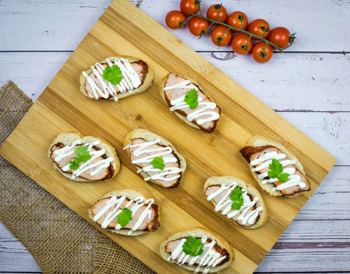 Pork Tenderloin Crostini with Lime Crema
