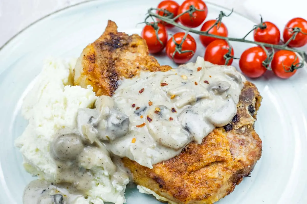Cast Iron Smothered Pork Chops